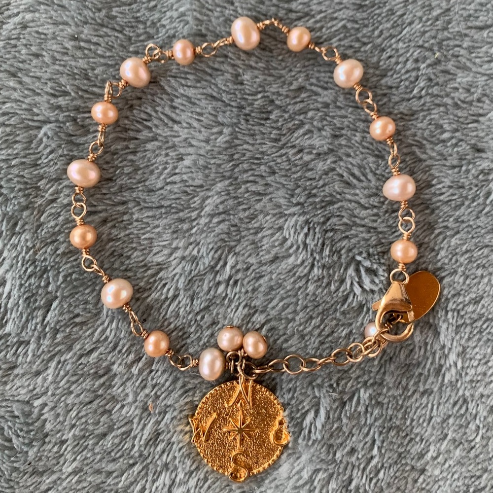Pink and gold pearled bracelent